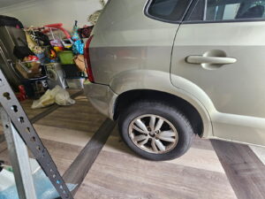 Repaired damaged car panel by a Dent Guy North Brisbane 